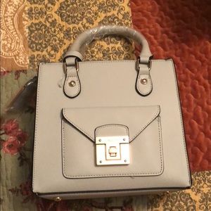 Also top handle/ crossbody bag